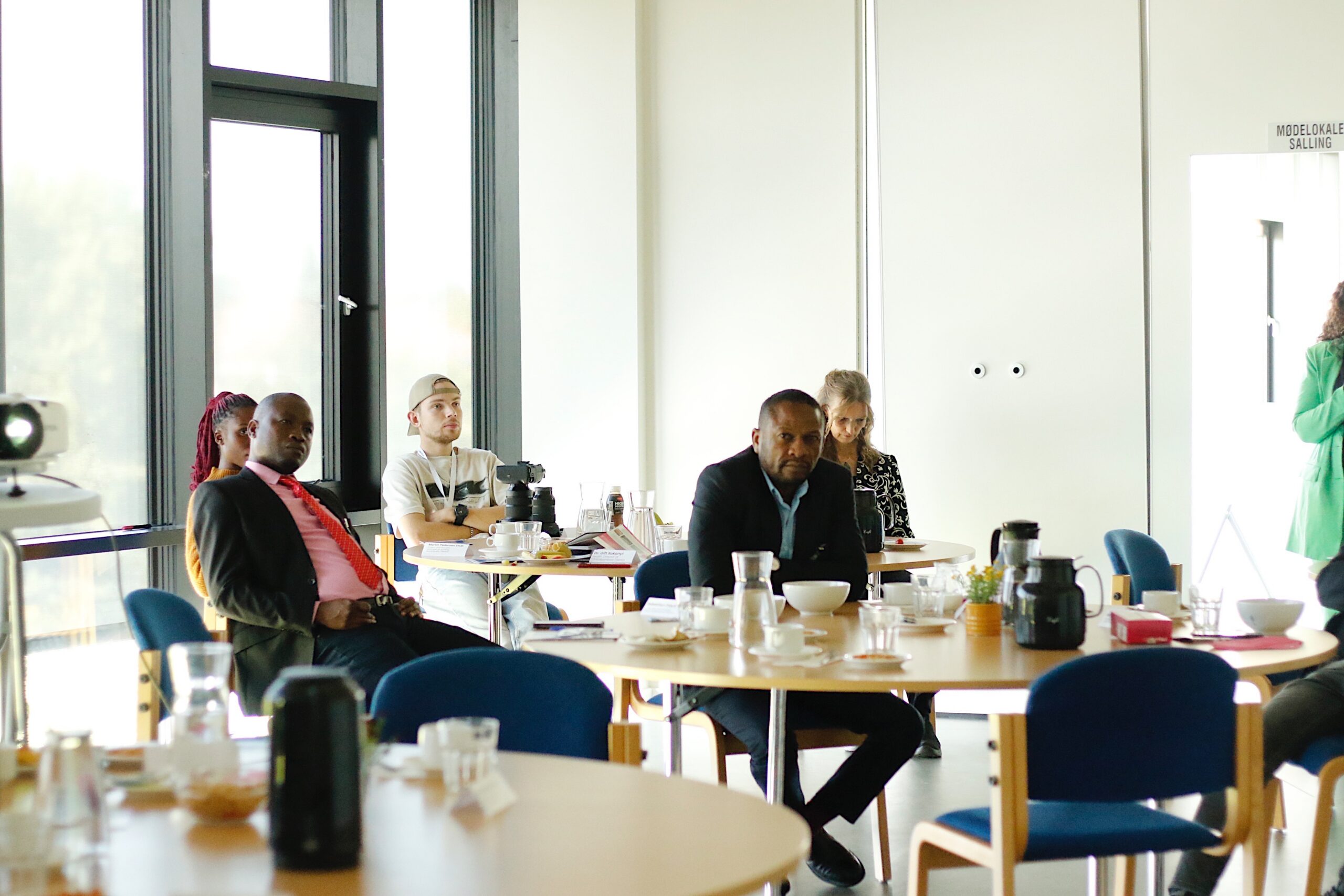 ZamNordic delegation meeting around a table in Zambia